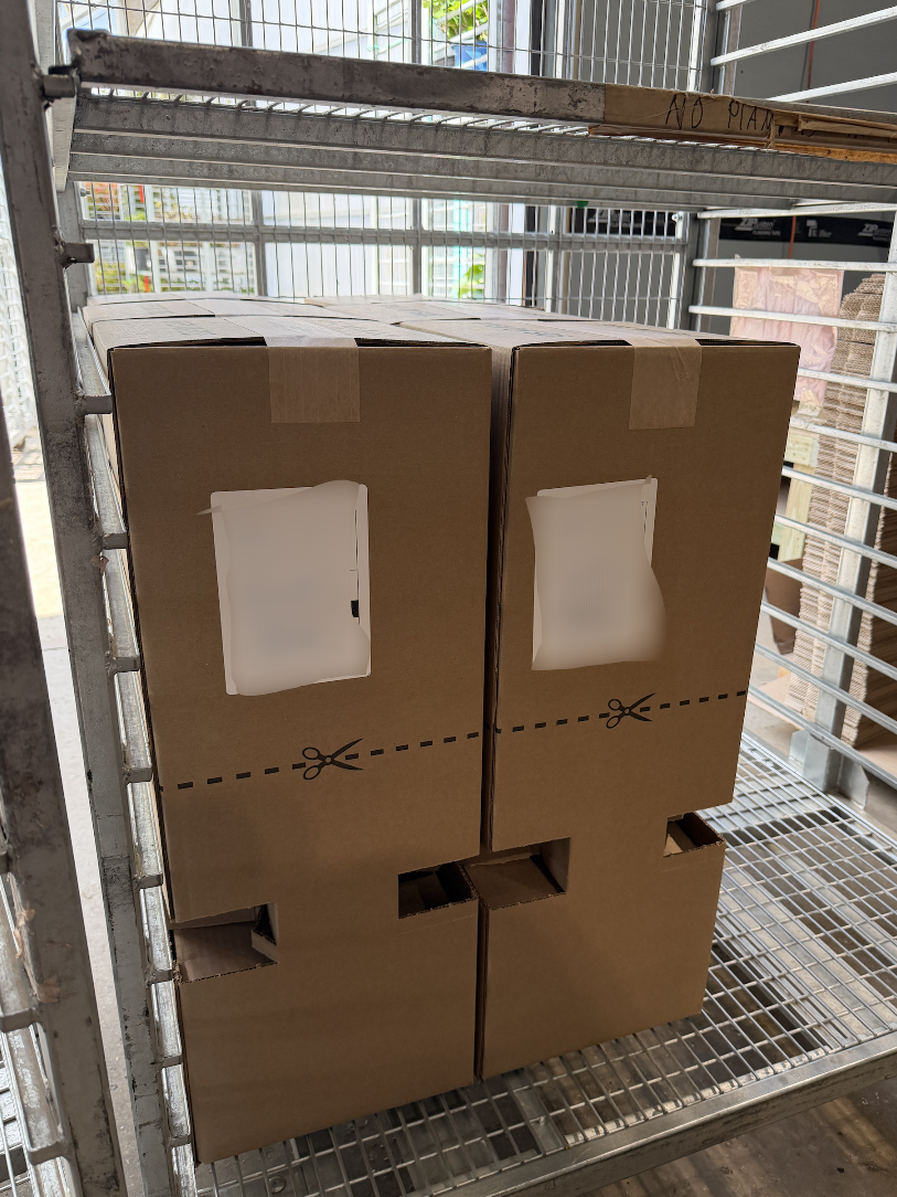 Plant in a container being prepared for shipment.